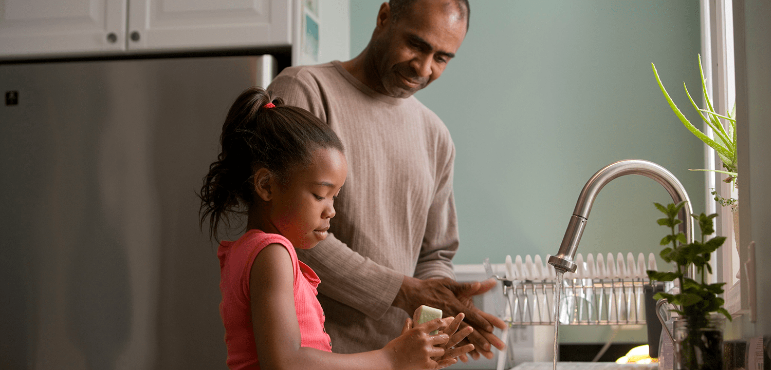 Father-Washing-Hands-With-Daughter