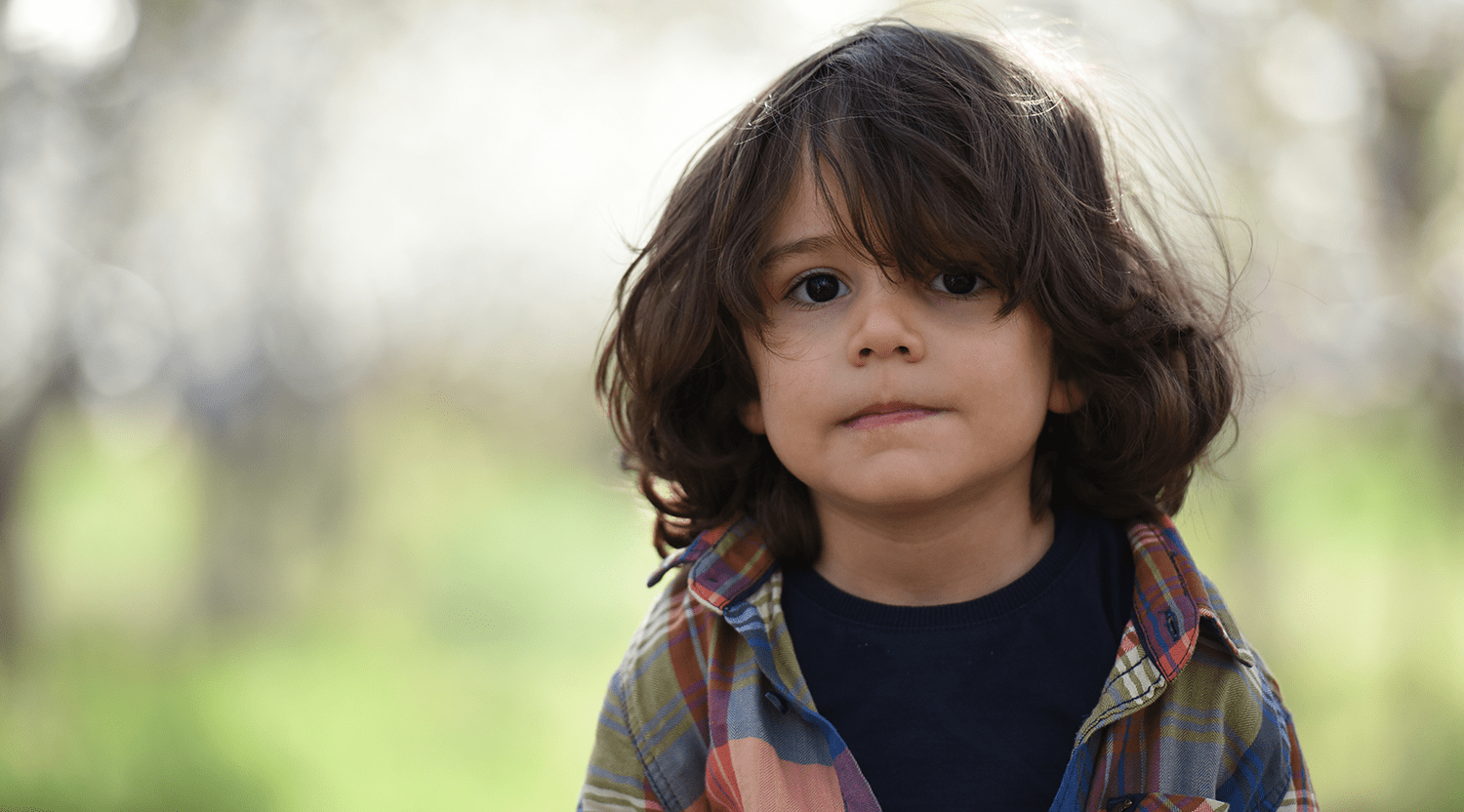 young-boy-with-long-hair